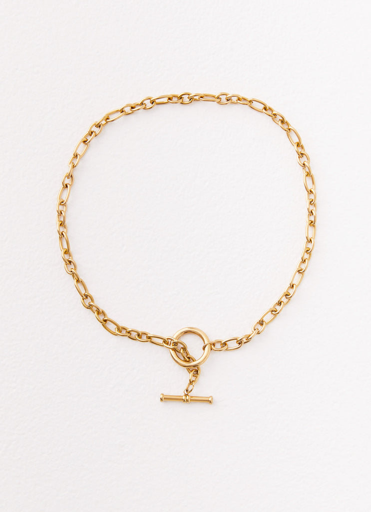 Womens Tally Chain Tin the colourBar Necklace in the colour Gold in front of a light grey background