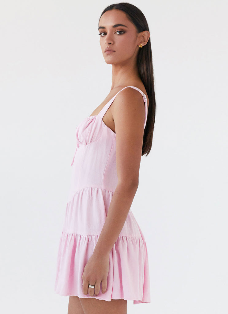 Womens Lucie Linen Mini Dress in the colour Pink in front of a light grey background