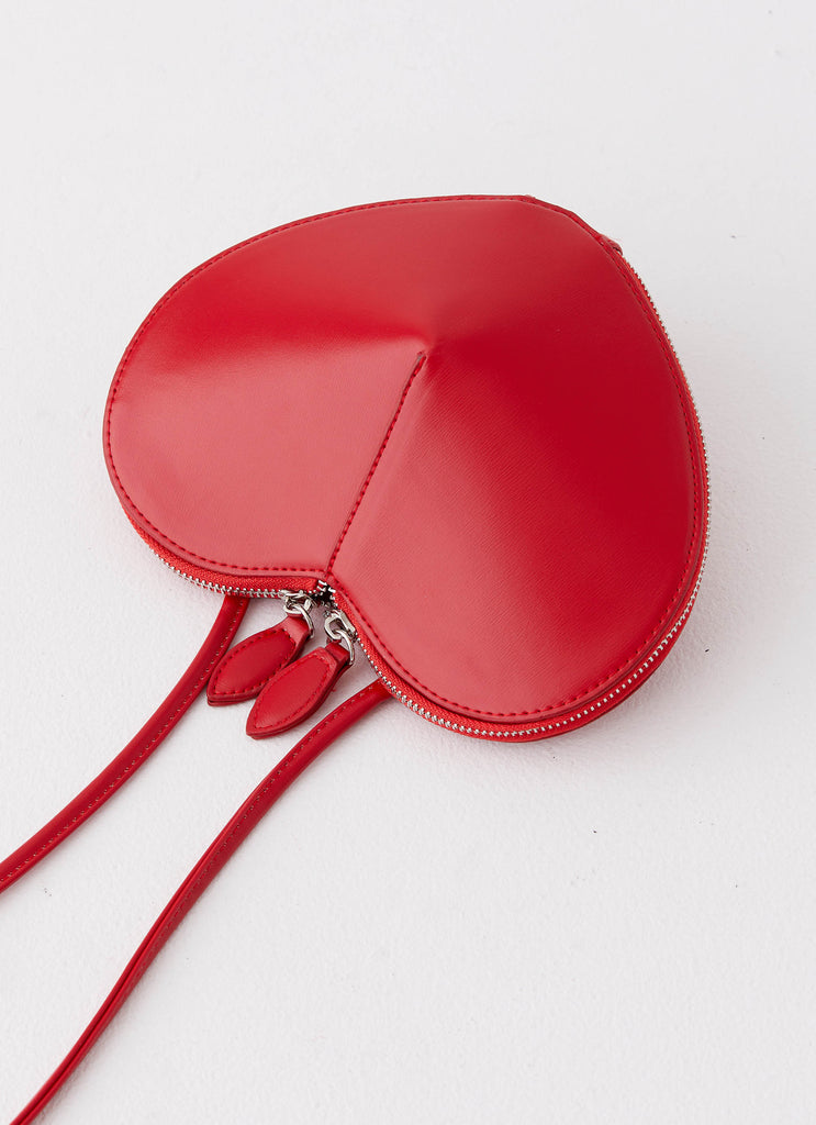 Womens My Love Cross Body Bag in the colour Red in front of a light grey background