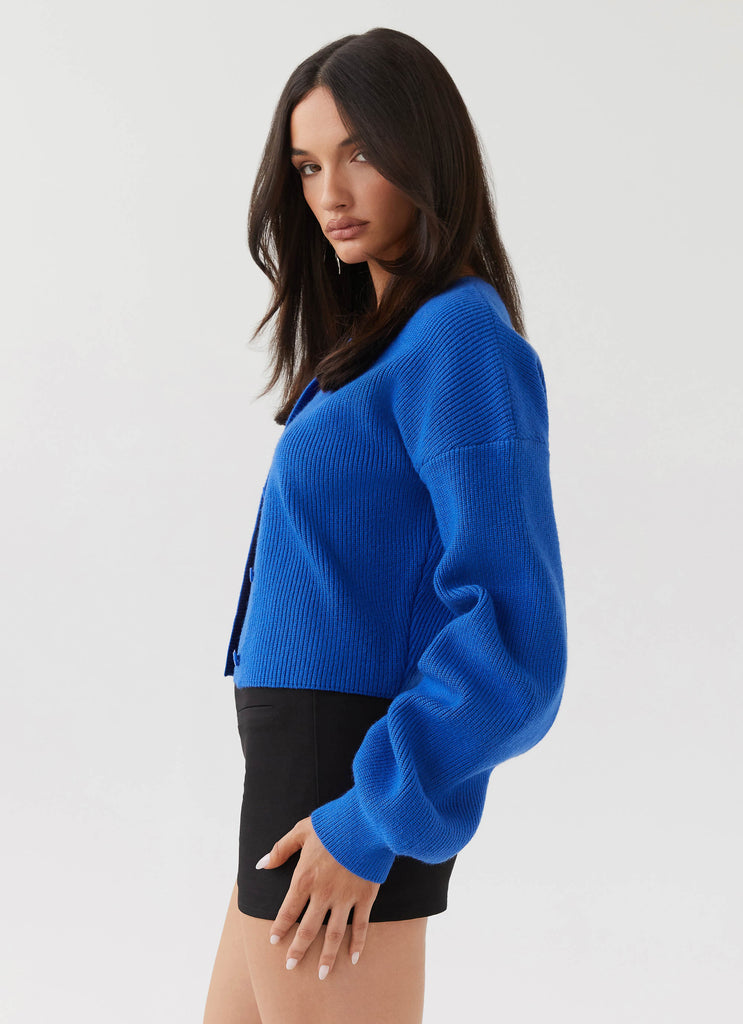 Womens Daphne Knit Cardigan in the colour Cobalt in front of a light grey background