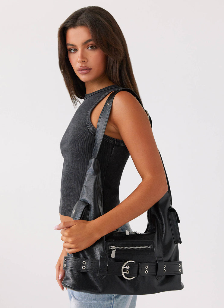 Womens Emerie Shoulder Bag in the colour Black in front of a light grey background