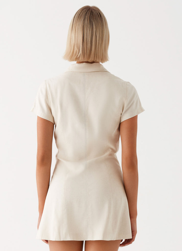 Womens Russo Linen Mini Dress in the colour Oatmeal in front of a light grey background