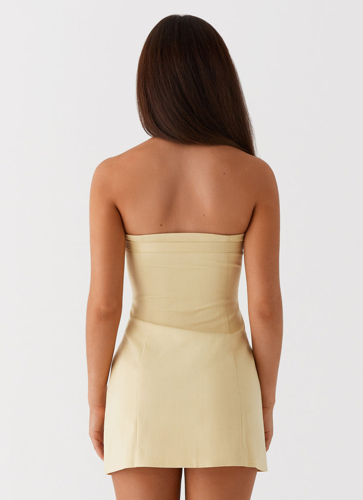 Womens Saskia Mini Dress in the colour Yellow in front of a light grey background