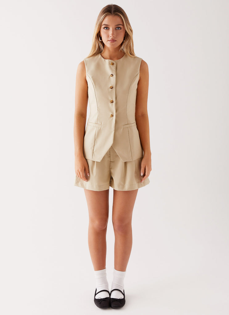 Womens Siena Style Tailored Shorts in the colour Beige in front of a light grey background