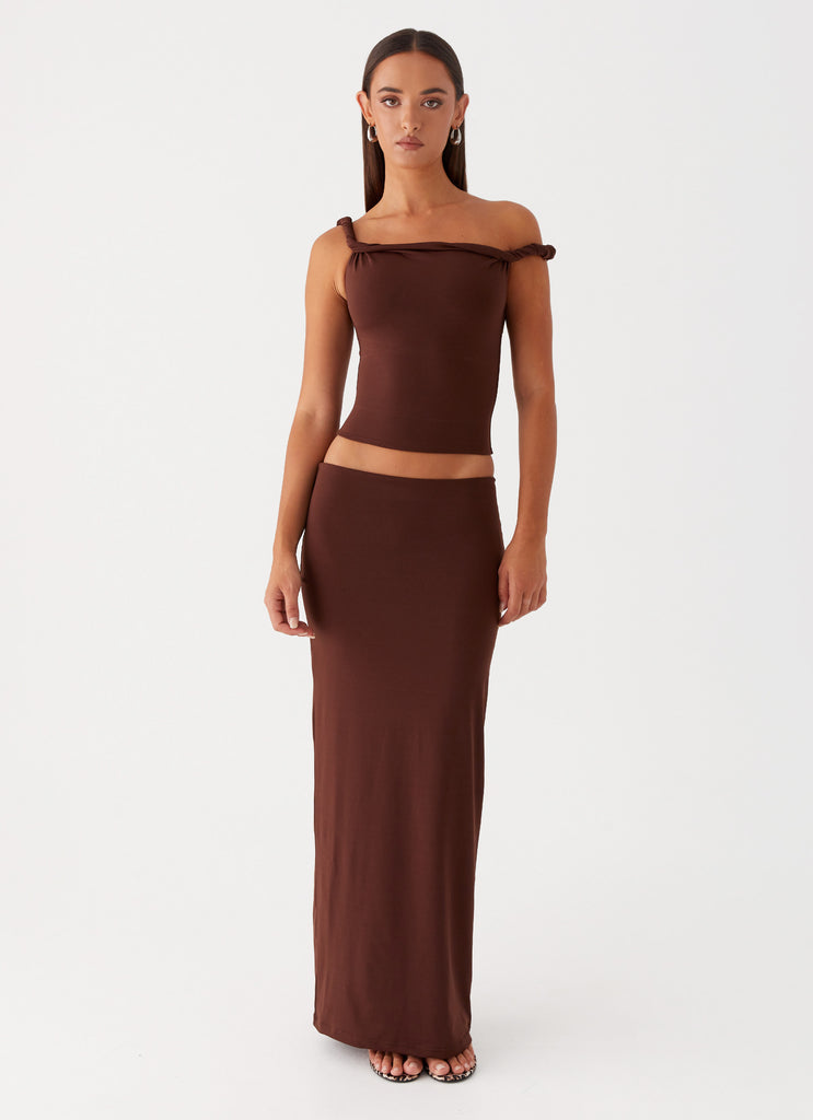 Womens Solace Soul Maxi Skirt in the colour Chocolate in front of a light grey background