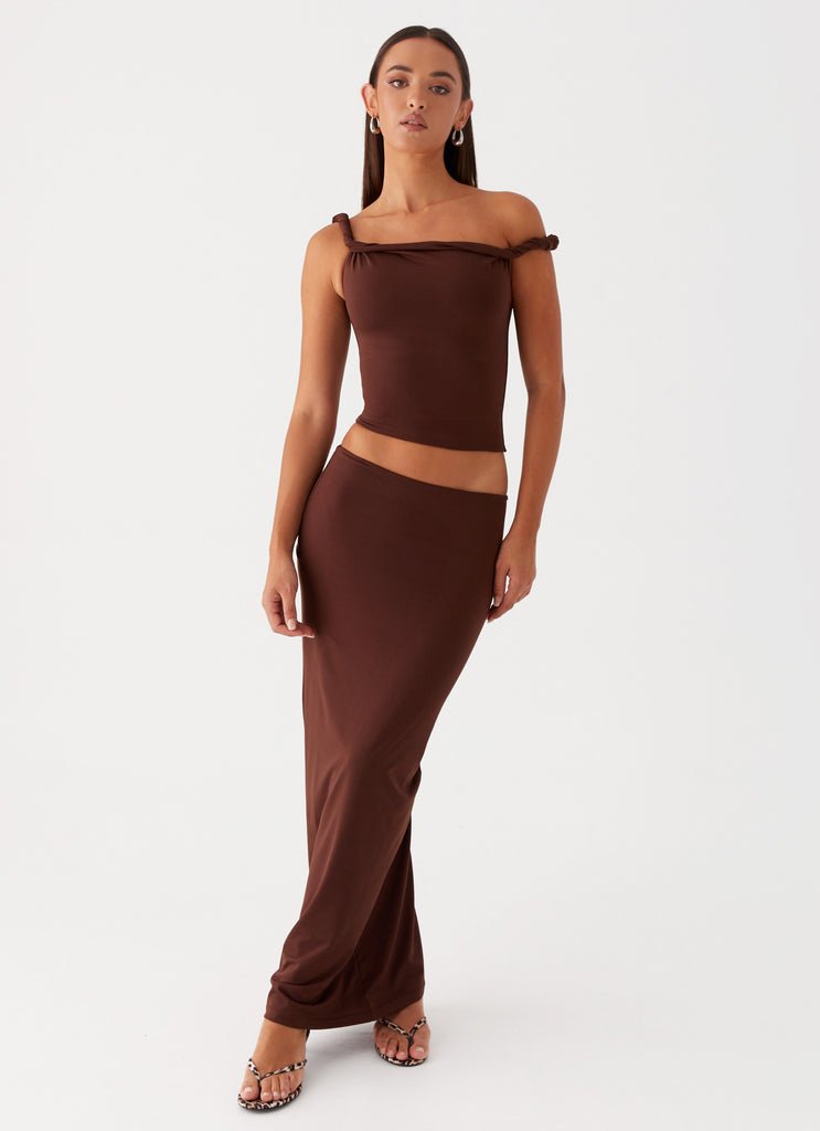 Womens Solace Soul Twist Shoulder Top in the colour Chocolate in front of a light grey background