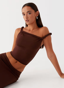 Womens Solace Soul Twist Shoulder Top in the colour Chocolate in front of a light grey background