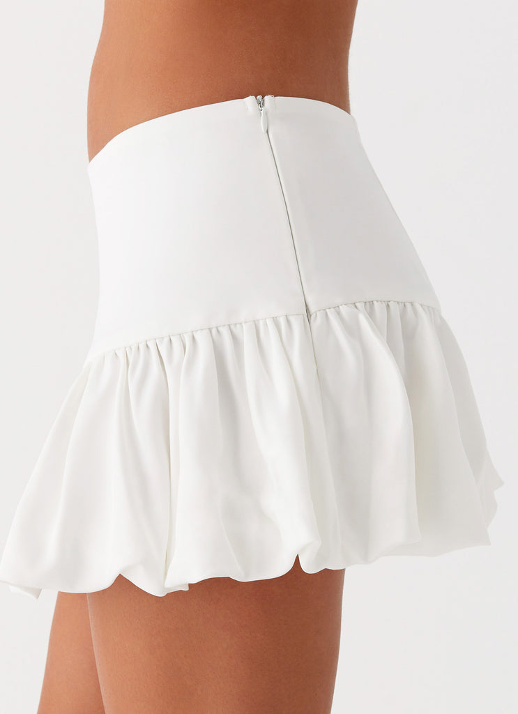 Womens Sweet Thing Bubble Hem Mini Skirt in the colour White in front of a light grey background