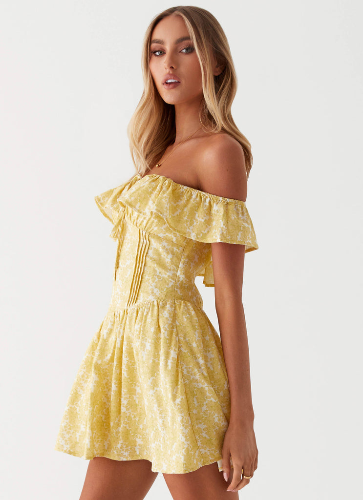 Womens Tarryn Mini Dress in the colour Yellow Floral in front of a light grey background