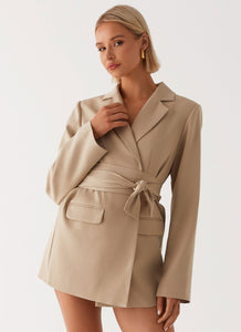 Womens Clara Blazer Dress in the colour Brown in front of a light grey background