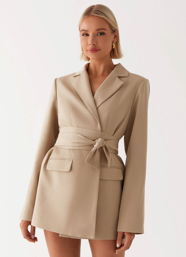 Womens Clara Blazer Dress in the colour Brown in front of a light grey background