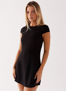 Womens Tia Mini Dress in the colour Black in front of a light grey background