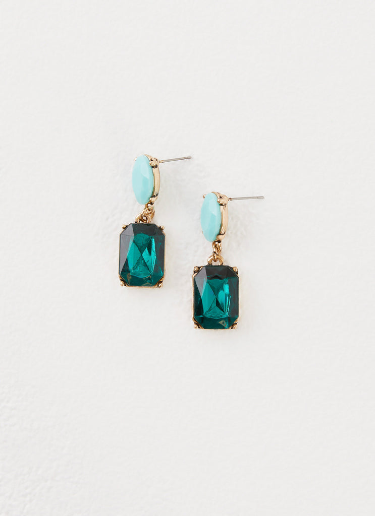 Womens Under The Moonlight Earrings in the colour Green in front of a light grey background