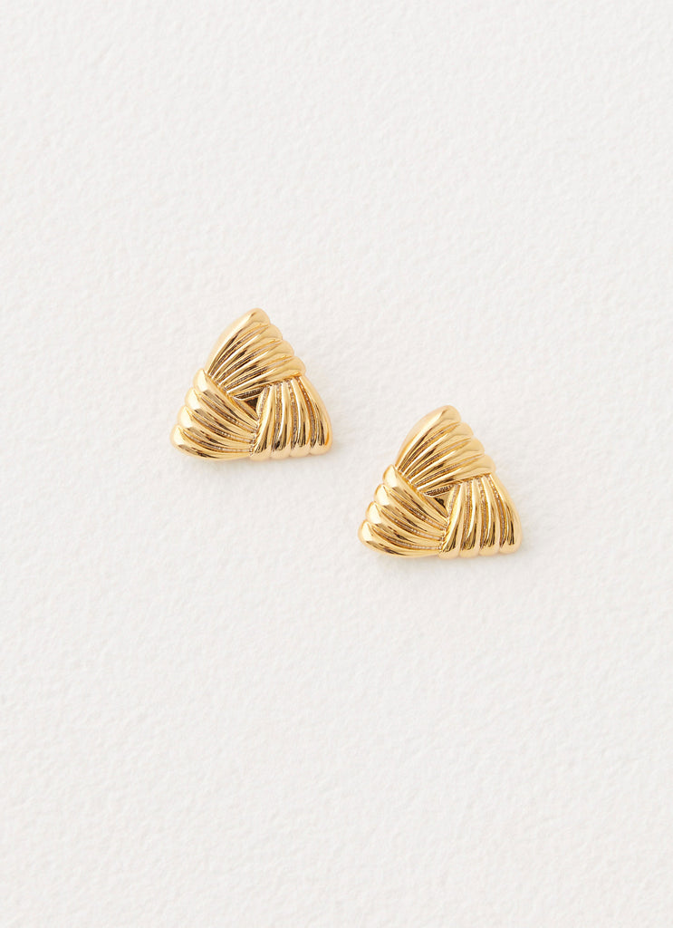 Womens Unholy Earrings in the colour Gold in front of a light grey background