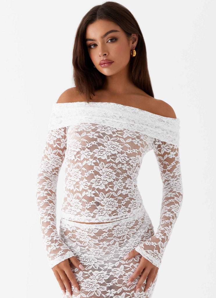 Womens Zephyra Lace Long Sleeve Top in the colour White in front of a light grey background