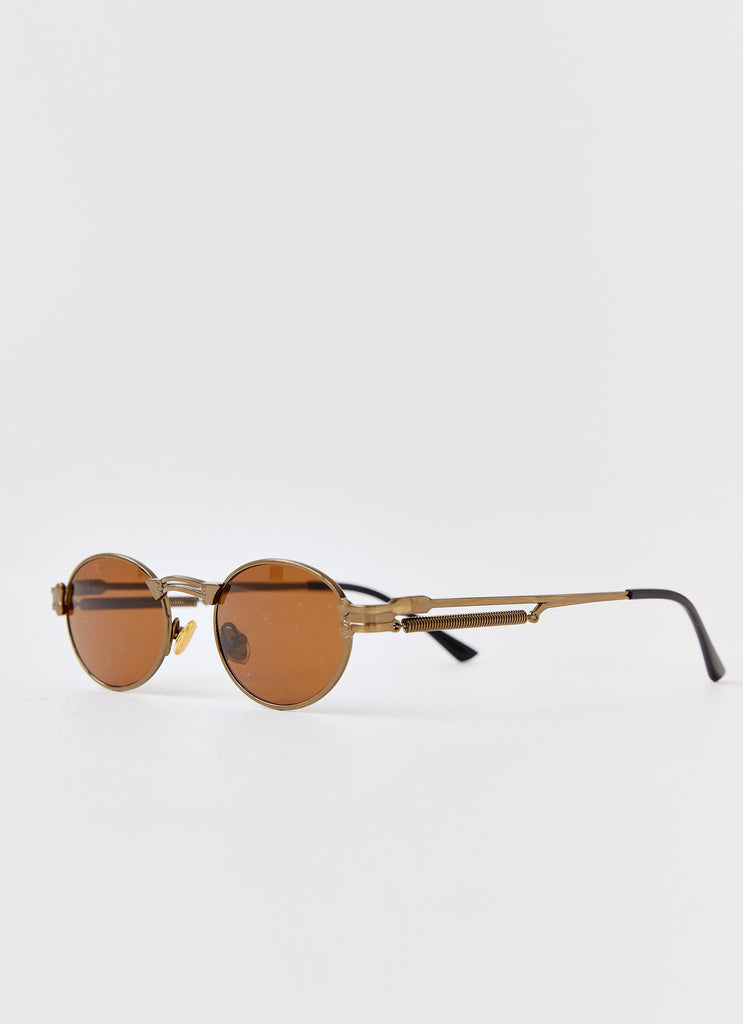 Womens Starbeam Sunglasses in the colour Brown in front of a light grey background