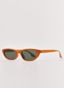Womens Nirvana Sunglasses in the colour Brown in front of a light grey background