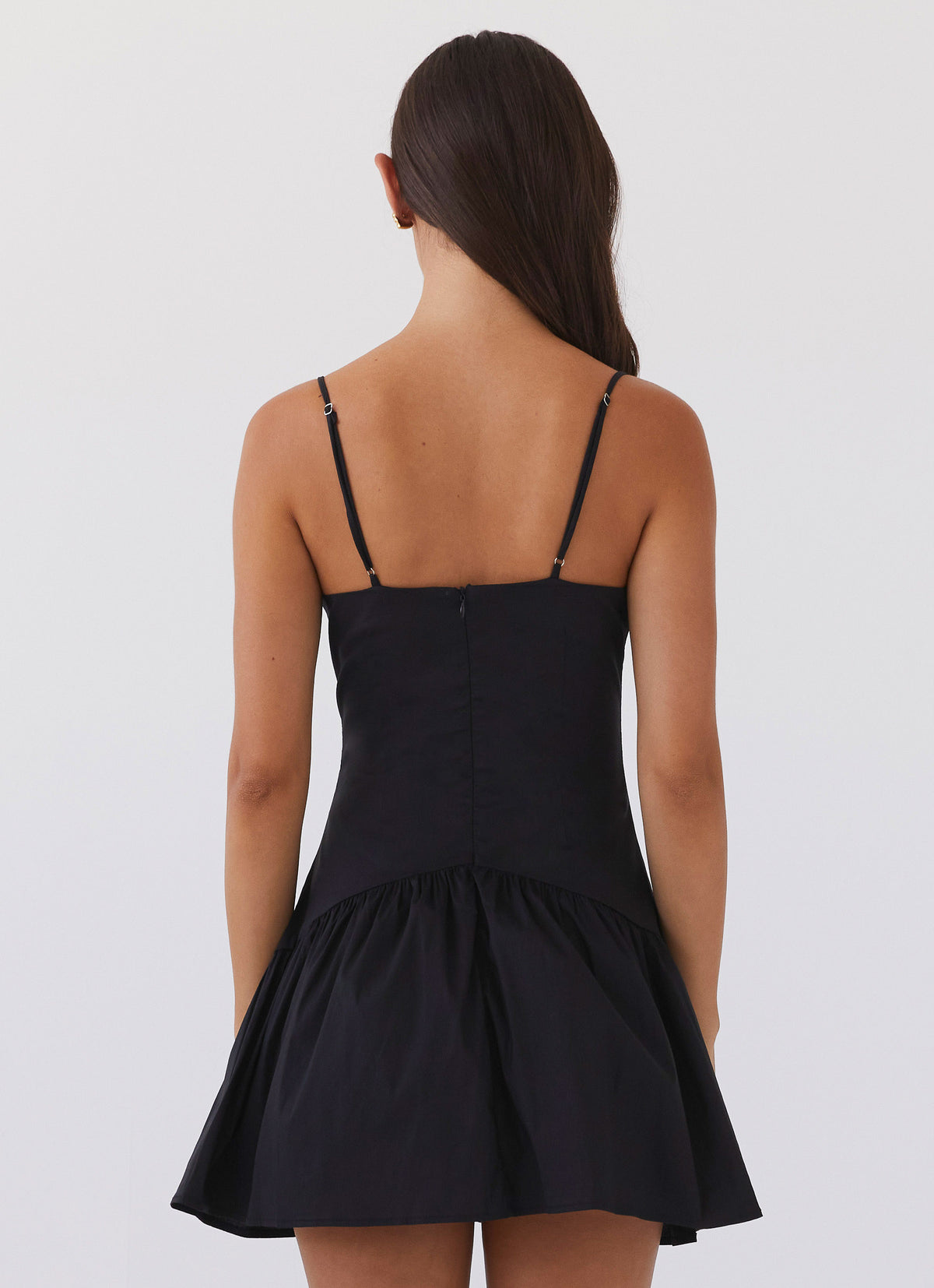 Womens Endless Summer Mini Dress in the colour Black in front of a light grey background