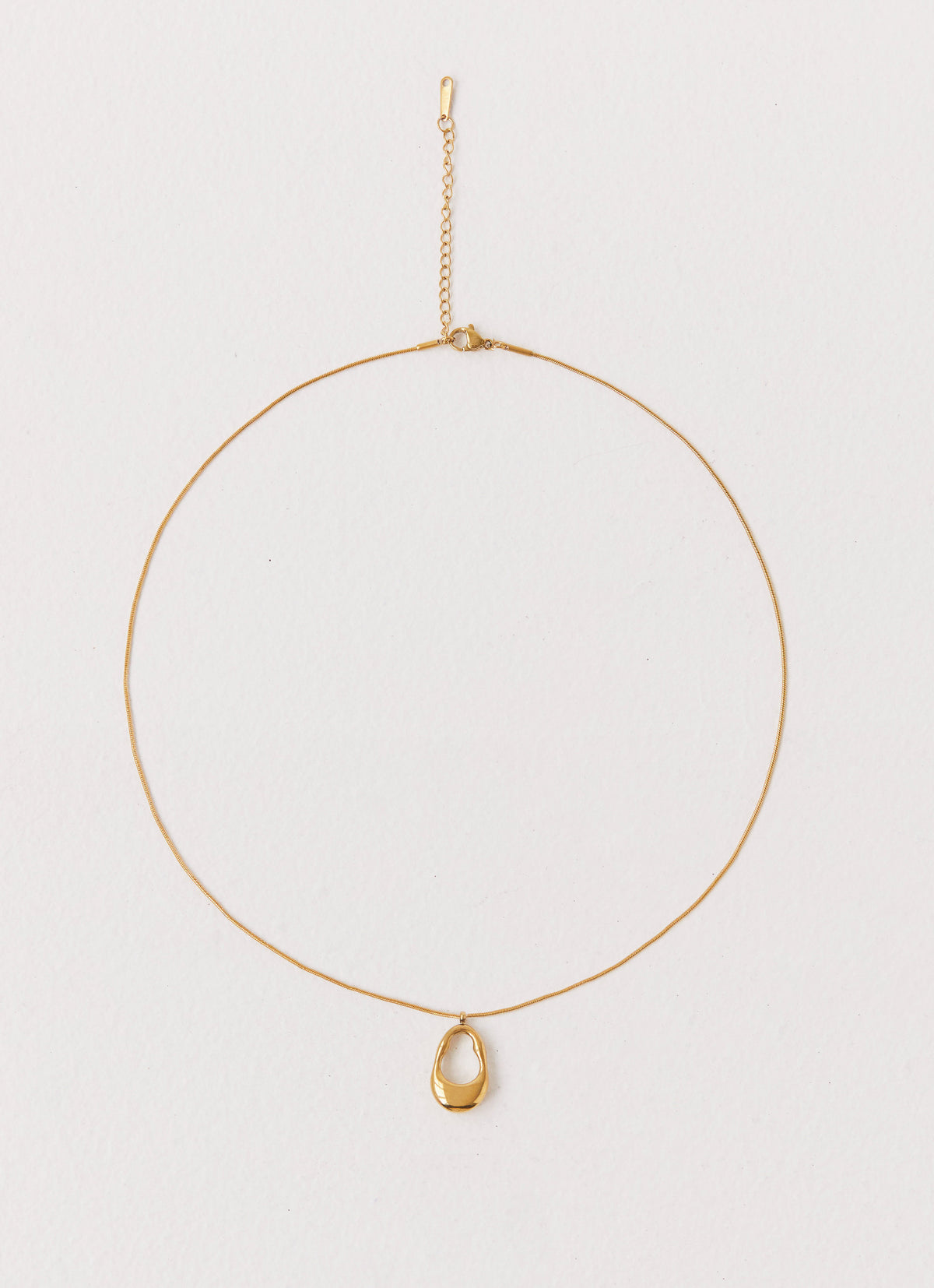 Womens Blissful Necklace in the colour Gold in front of a light grey background