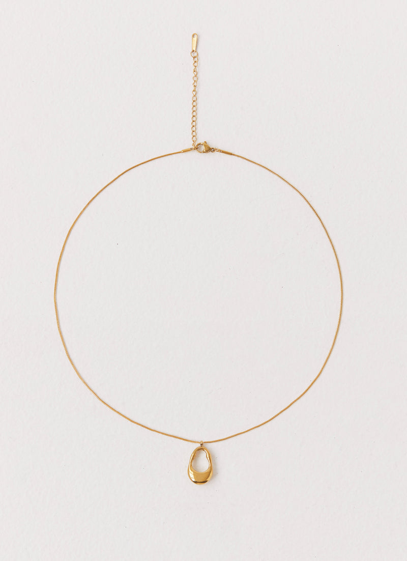 Womens Blissful Necklace in the colour Gold in front of a light grey background