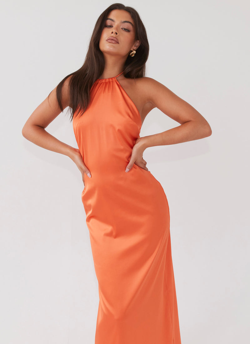 Womens Melody Day Halterneck Maxi Dress in the colour Tangerine in front of a light grey background